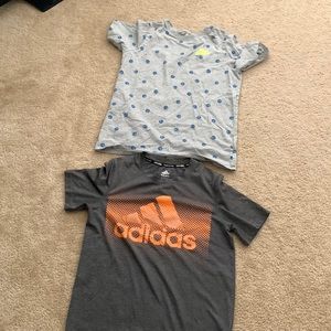 2 Boys’ Medium Athletic shirts by Nike and Adidas. Multi color.